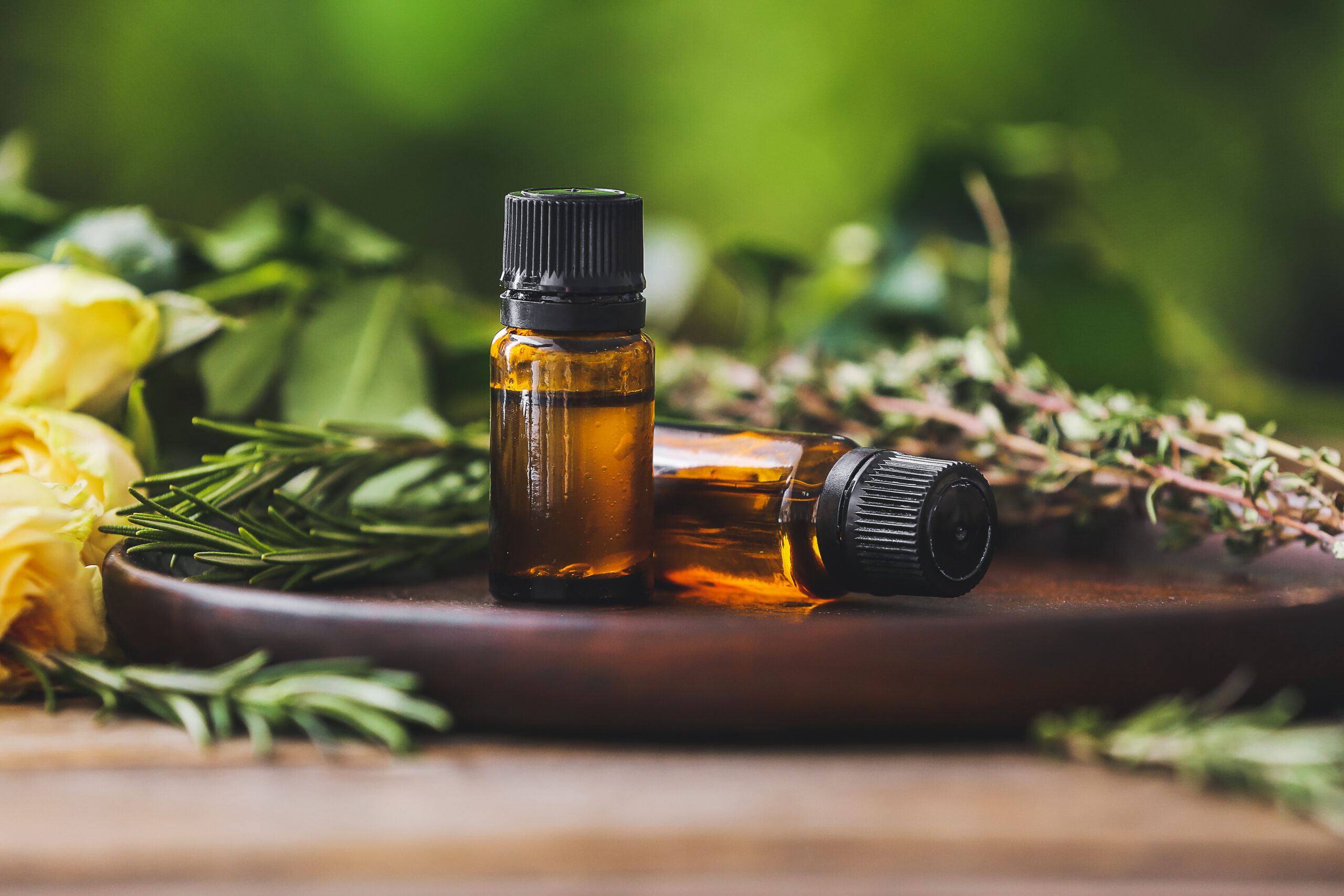 Bottles of Essential Oil on Table